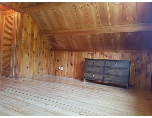 74 Watatic Mountain Road Ashby, MA 01431 - Photo 15 of 35 an empty room with wooden floor