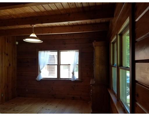 74 Watatic Mountain Road Ashby, MA 01431 - Photo 17 of 35 a view of a hallway with a window