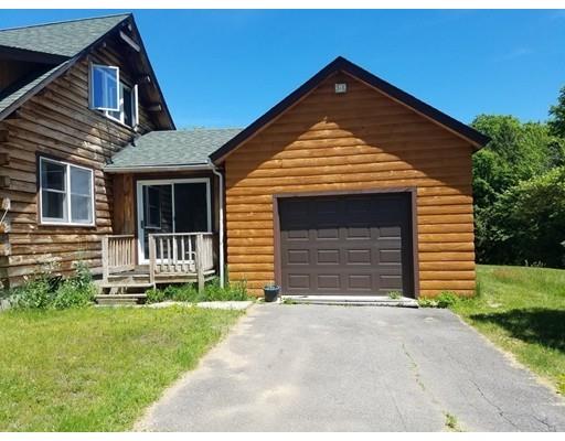 74 Watatic Mountain Road Ashby, MA 01431 - Photo 25 of 35 a front view of a house with a yard