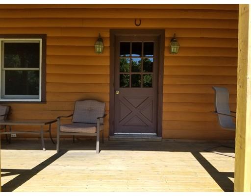 74 Watatic Mountain Road Ashby, MA 01431 - Photo 32 of 35 a view of house with door and outdoor space