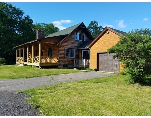 74 Watatic Mountain Road Ashby, MA 01431 - Photo 4 of 35 a front view of a house with garden