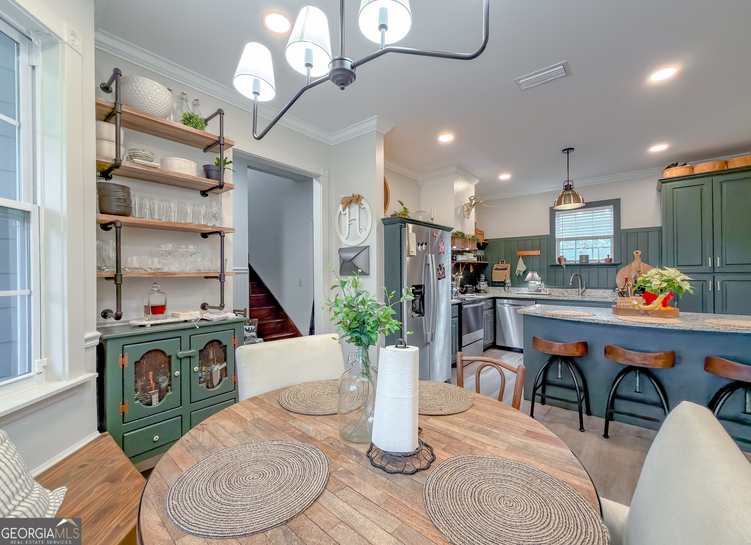 100 Robin Lane Bainbridge, GA 39819 - Photo 24 of 74 a living room with stainless steel appliances kitchen island granite countertop furniture and a kitchen view
