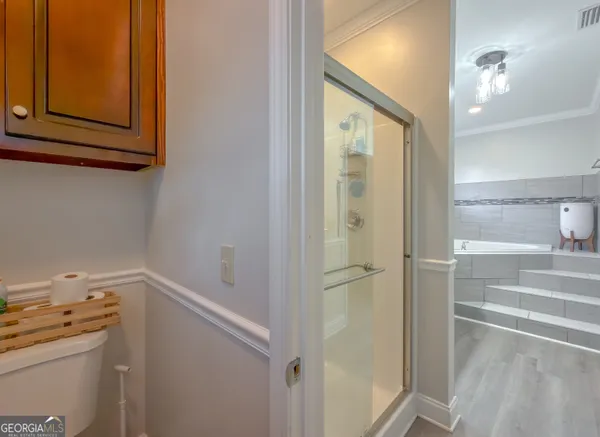 a view of workspace with wooden floor