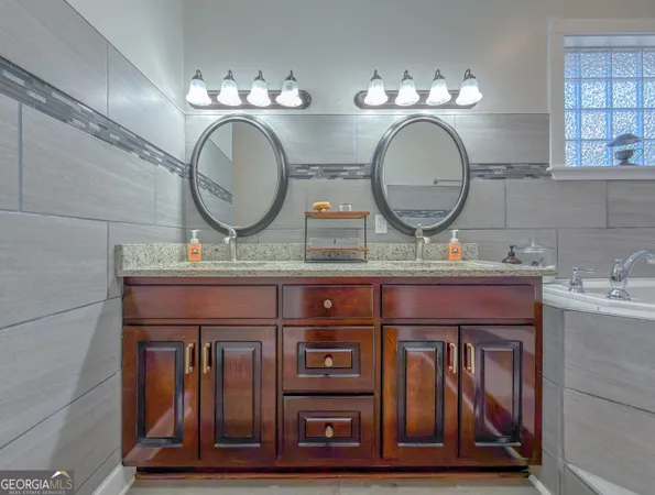 a dining room with furniture window and wooden floor