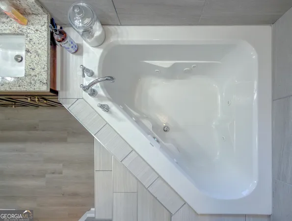 a view of a dinning table and chairs in patio of the house