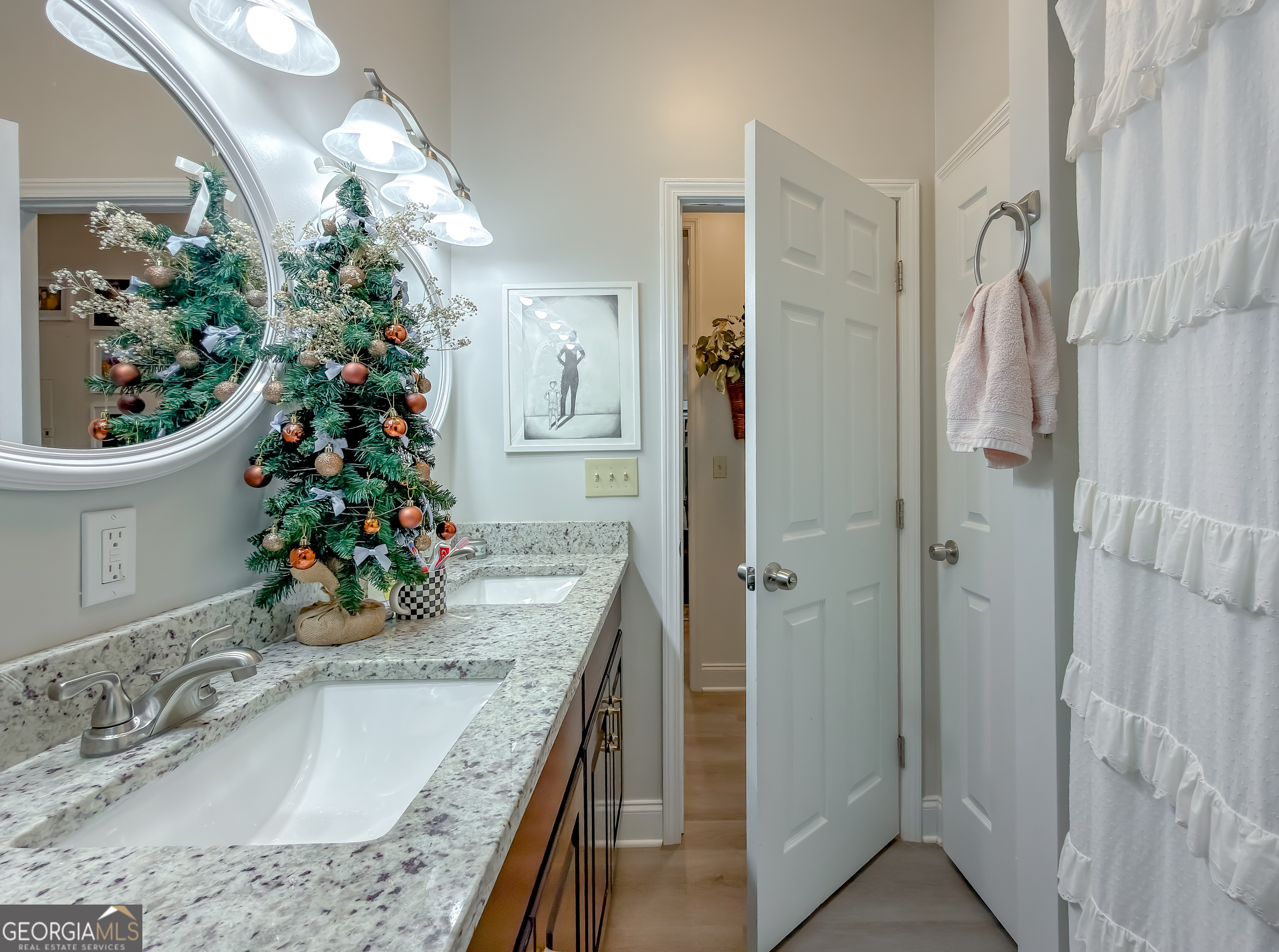 100 Robin Lane Bainbridge, GA 39819 - Photo 42 of 74 a bathroom with a granite countertop sink a large mirror and a shower