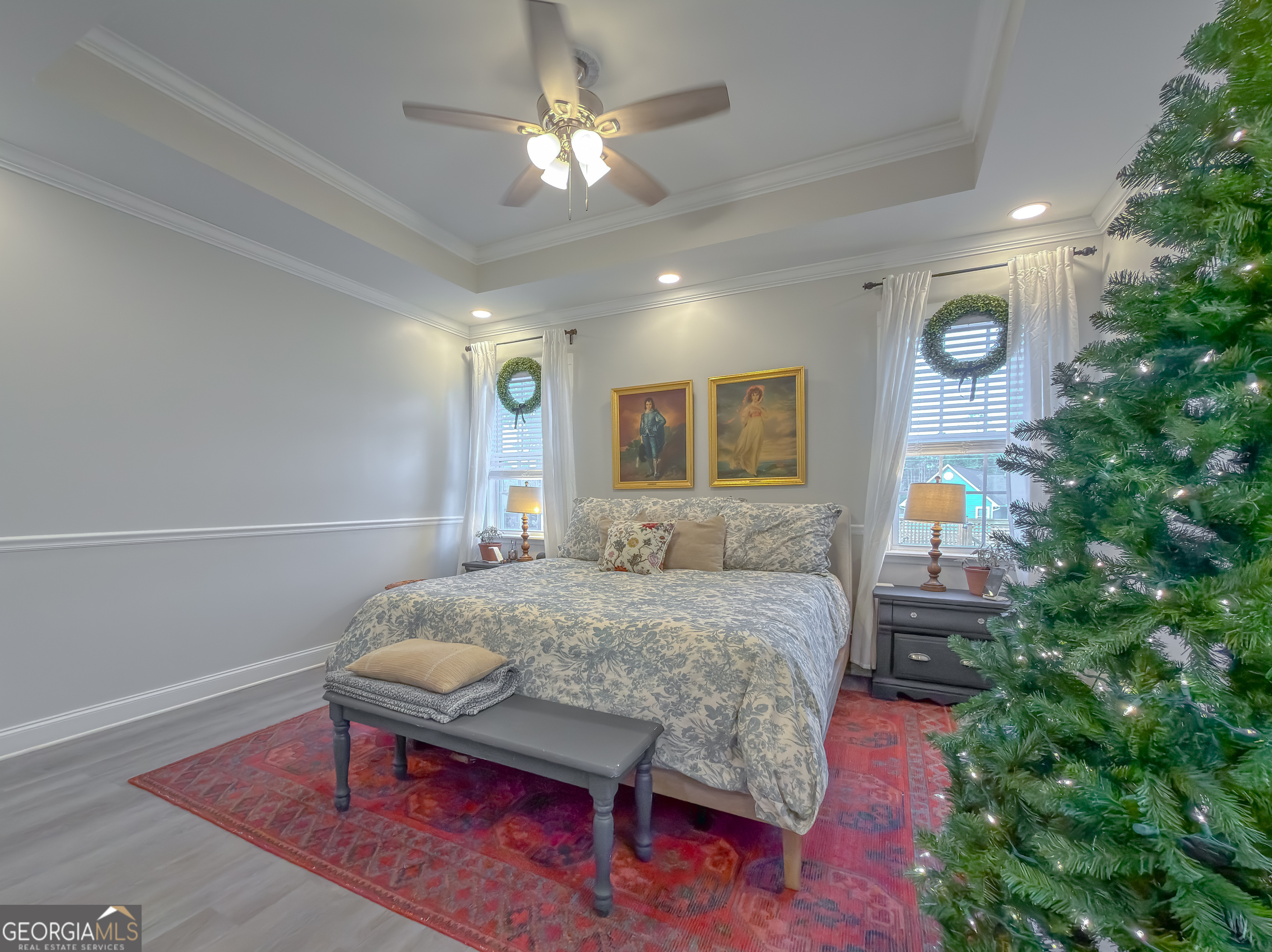 100 Robin Lane Bainbridge, GA 39819 - Photo 48 of 74 a bedroom with a bed and a chandelier