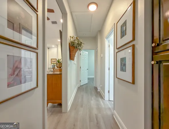 a front view of house with deck and seating space