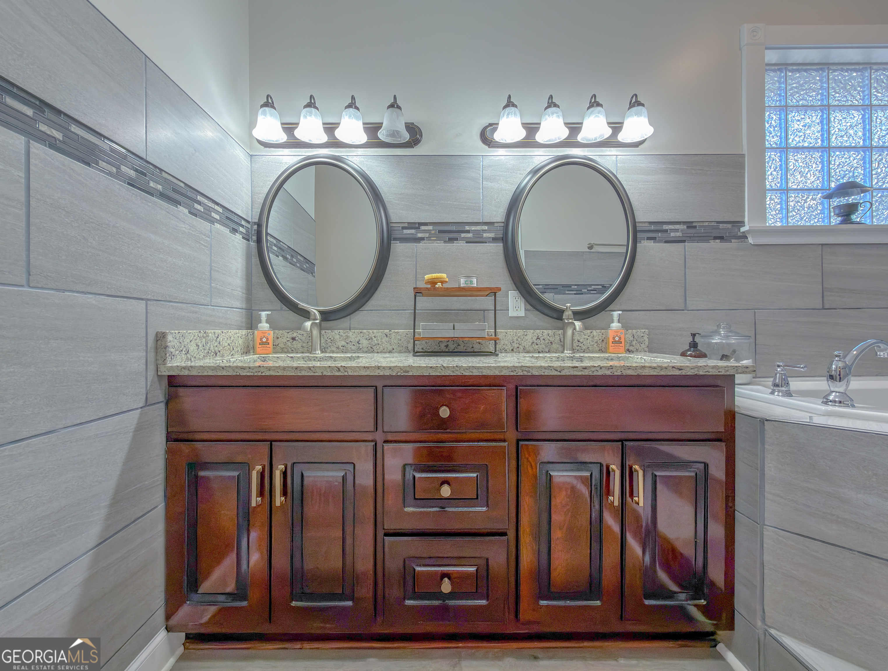 100 Robin Lane Bainbridge, GA 39819 - Photo 56 of 74 a bathroom with a sink and a mirror