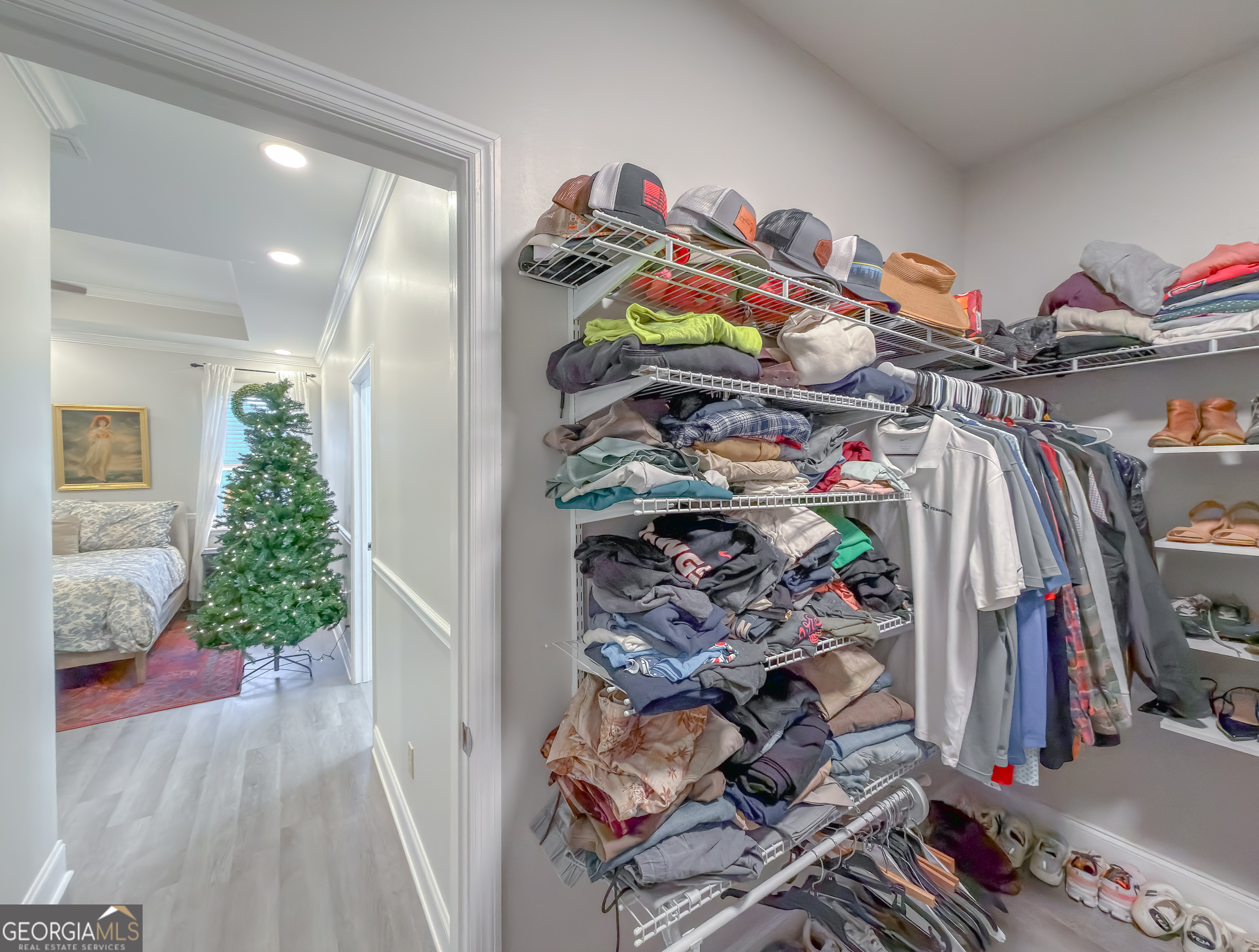 100 Robin Lane Bainbridge, GA 39819 - Photo 59 of 74 a view of walk in closet with clothes and shoes