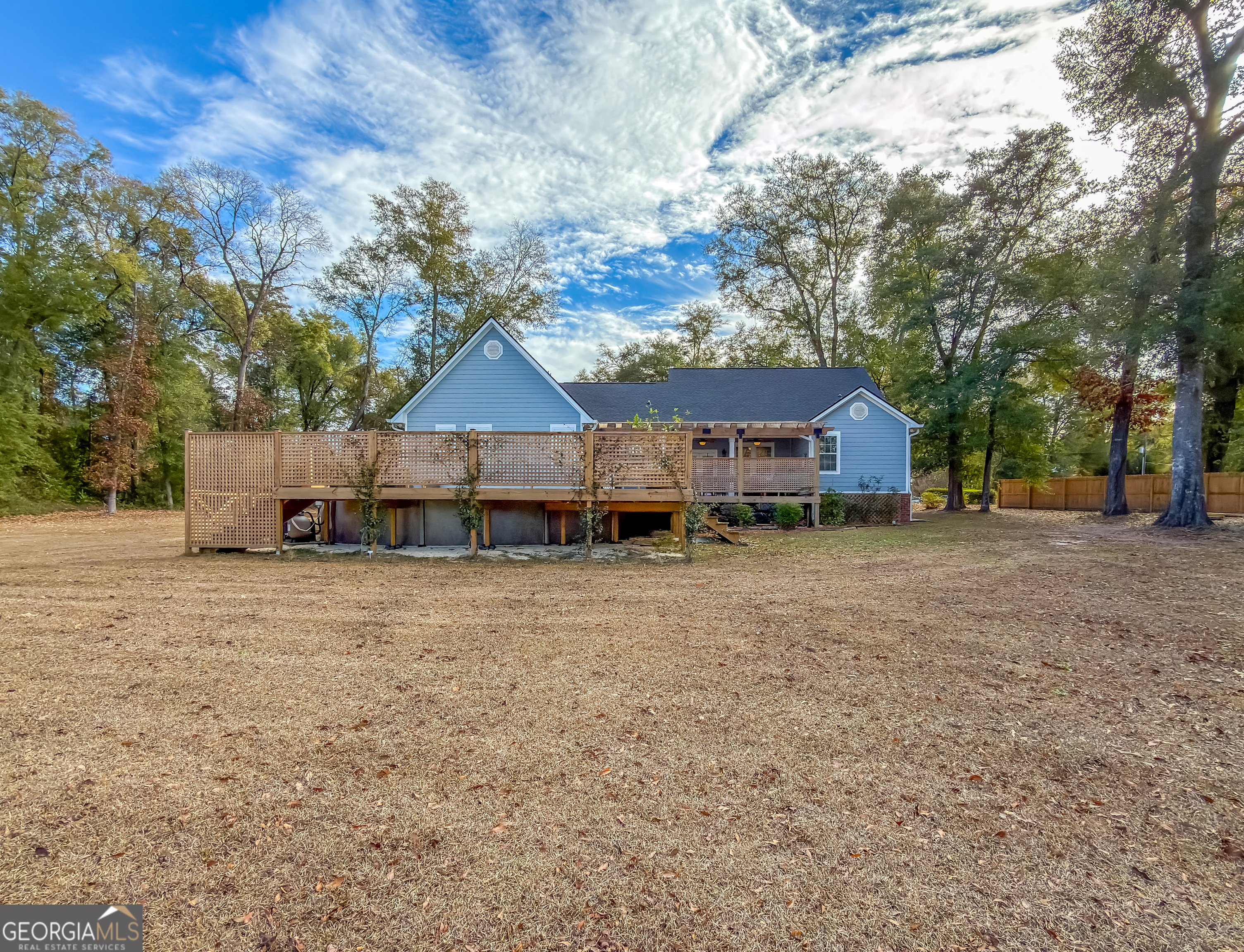 100 Robin Lane Bainbridge, GA 39819 - Photo 73 of 74 a front view of a house with a yard and large trees