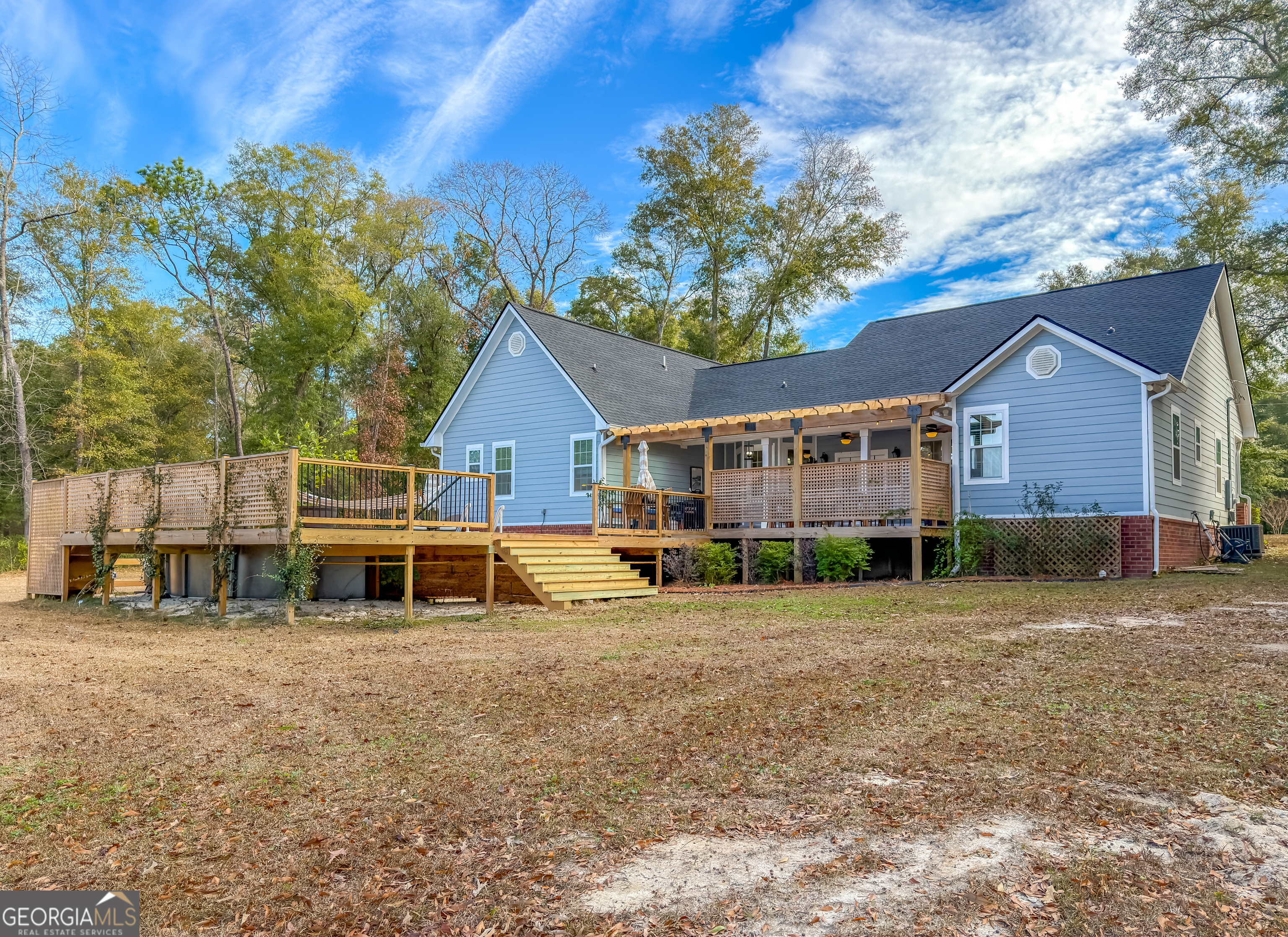 100 Robin Lane Bainbridge, GA 39819 - Photo 74 of 74 a view of a house with a yard and sitting area