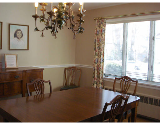 20 Philbrick Road Newton, MA 02459 - Photo 3 of 7 a view of a dining room with furniture window and outside view