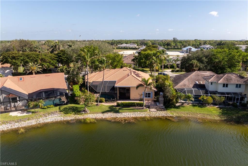 7126 Mill Run Road Naples, FL 34109 - Photo 43 of 49 Bird's eye view featuring a water view
