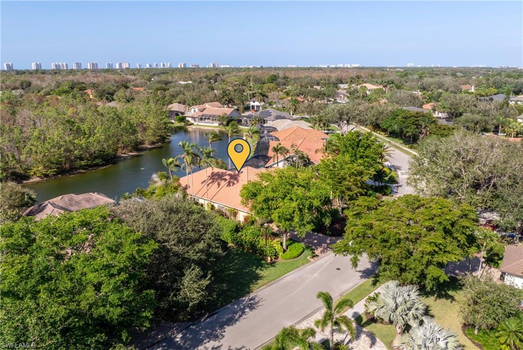 7126 Mill Run Road Naples, FL 34109 - Photo 45 of 49 Aerial view featuring a water view