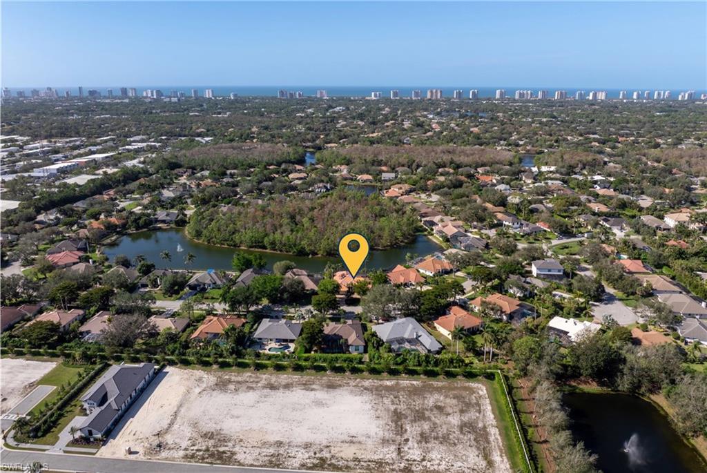 7126 Mill Run Road Naples, FL 34109 - Photo 47 of 49 Birds eye view of property with a water view