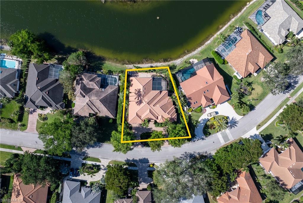 7126 Mill Run Road Naples, FL 34109 - Photo 48 of 49 Aerial view featuring a water view