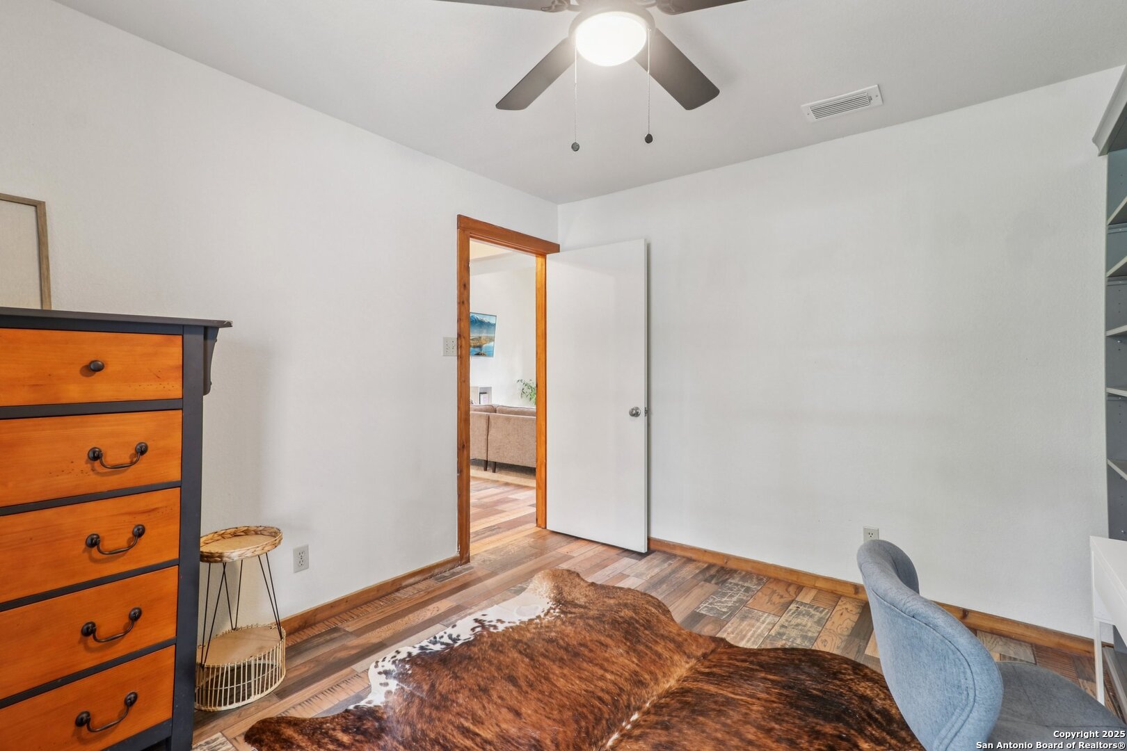 20211 County Road 174 Helotes, TX 78023 - Photo 21 of 45 a bedroom with a bed and a window