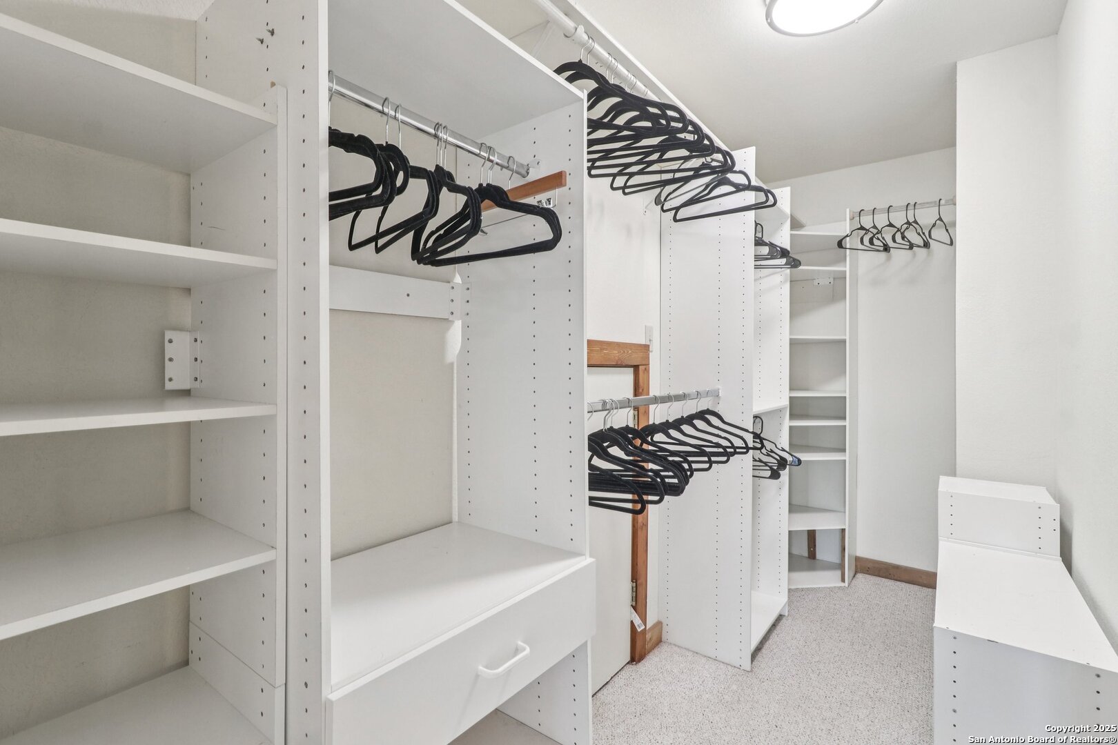 20211 County Road 174 Helotes, TX 78023 - Photo 30 of 45 a kitchen with a refrigerator and a stove