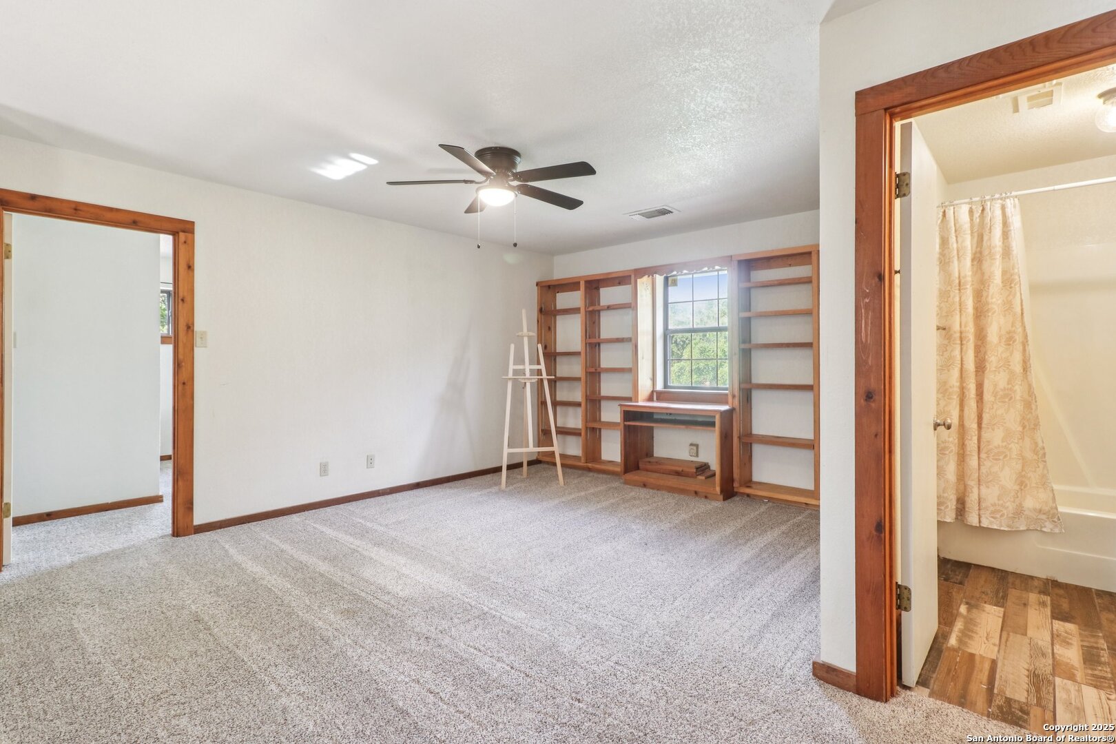 20211 County Road 174 Helotes, TX 78023 - Photo 32 of 45 a view of an empty room with a window