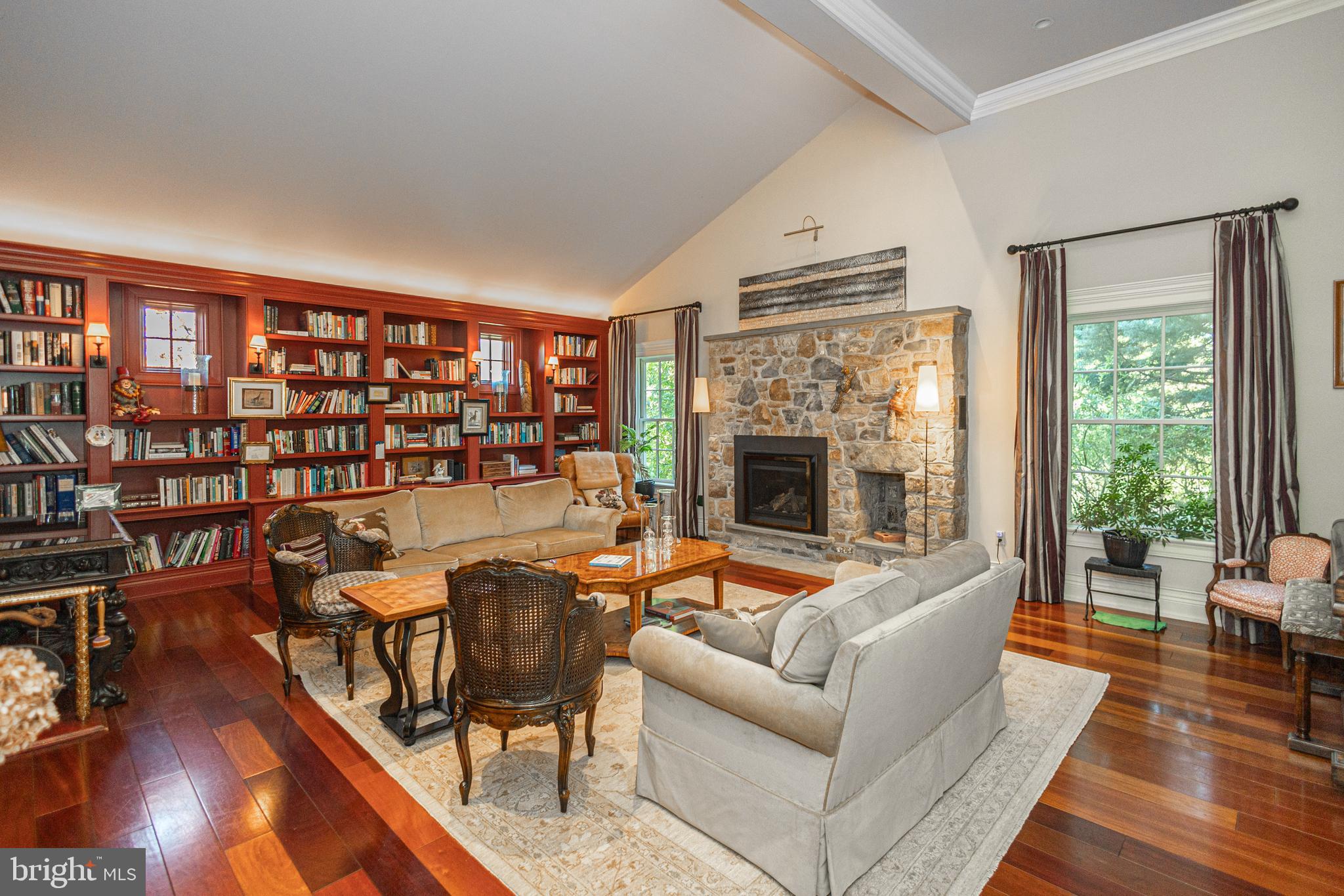 5025 Anderson Road Doylestown, PA 18902 - Photo 16 of 92 a living room with furniture and a fireplace