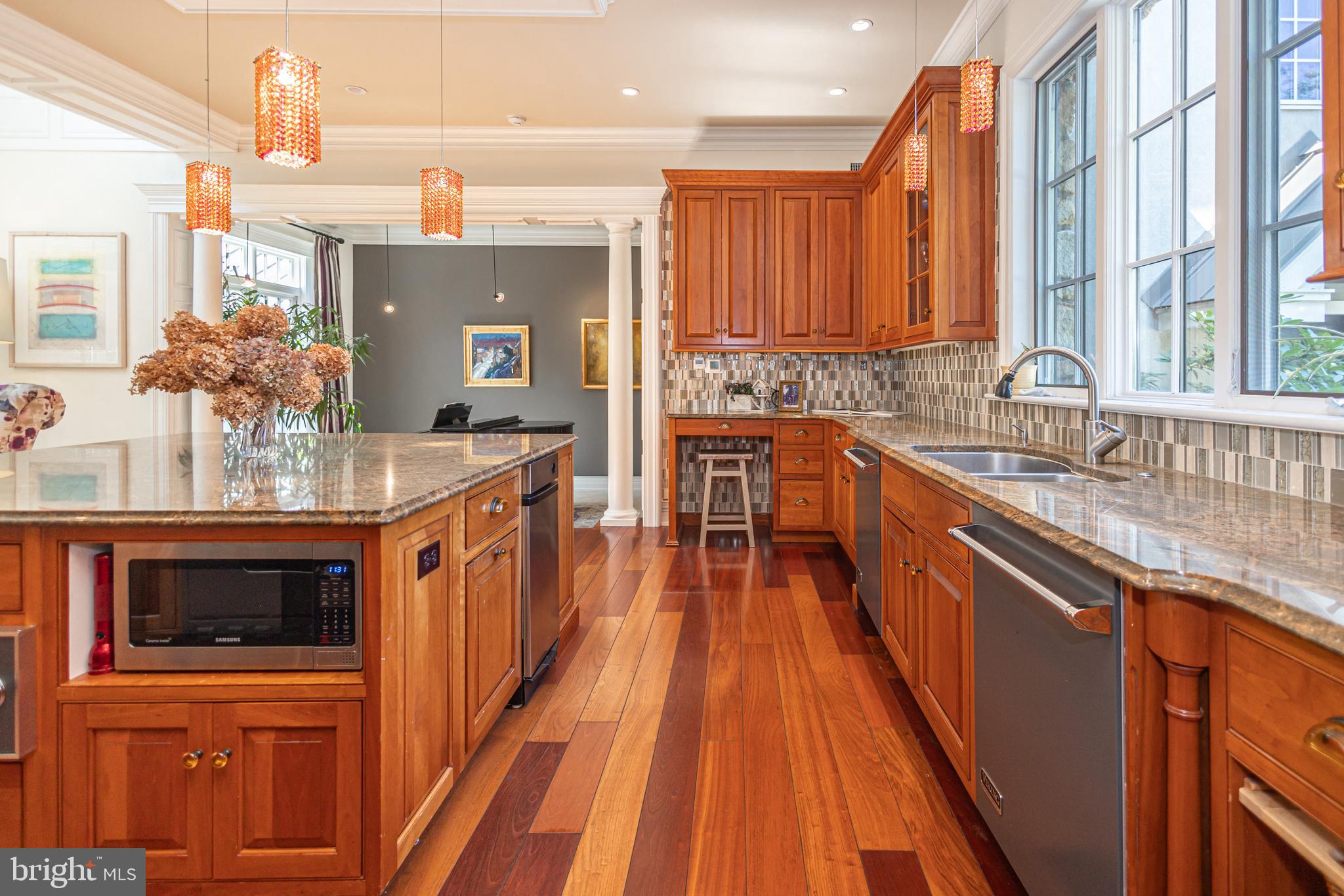 5025 Anderson Road Doylestown, PA 18902 - Photo 22 of 92 a kitchen with stainless steel appliances a sink stove and cabinets
