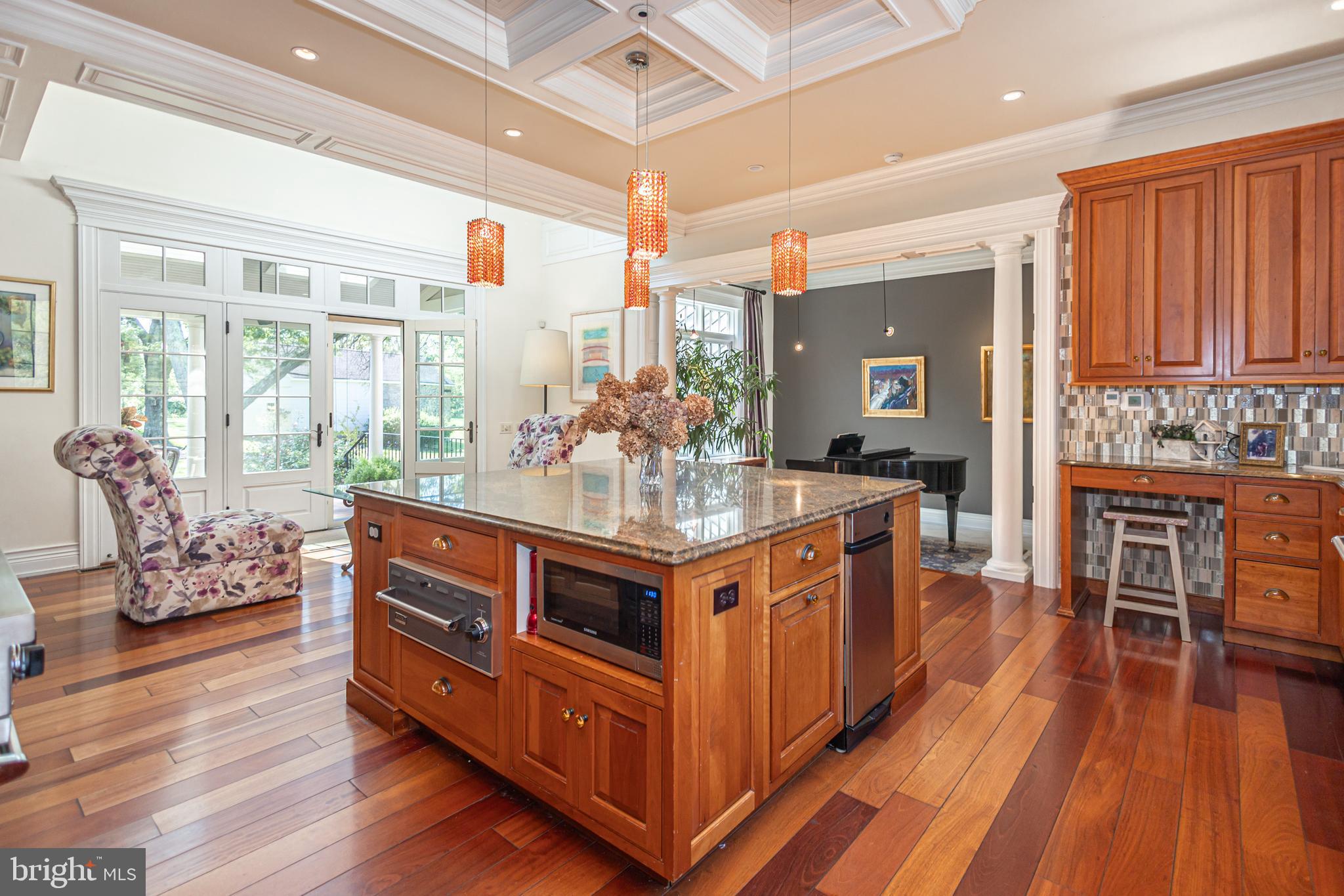 5025 Anderson Road Doylestown, PA 18902 - Photo 30 of 92 a kitchen with stainless steel appliances granite countertop a stove and a wooden floors