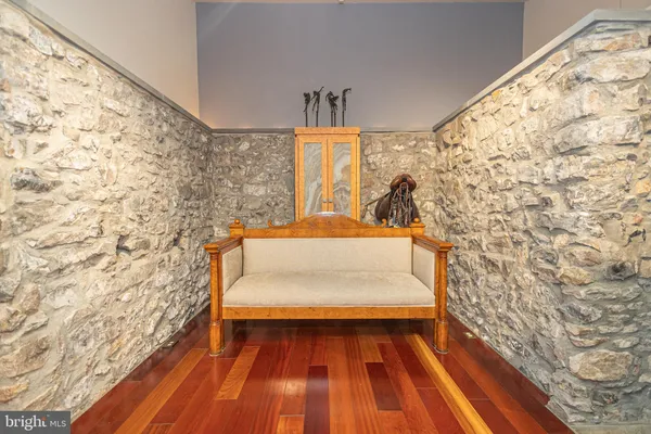 a view of livingroom with furniture and wooden floor