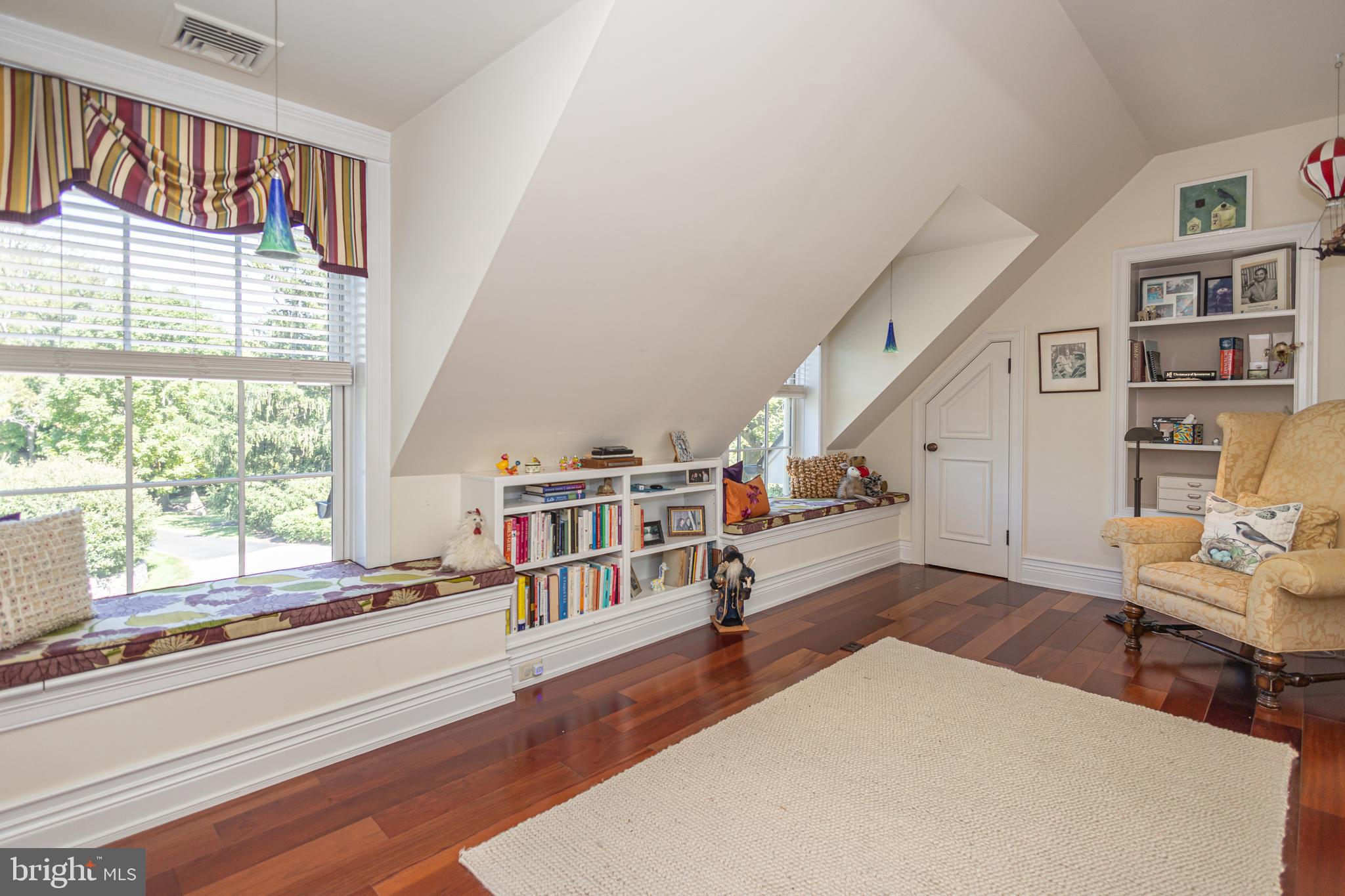 5025 Anderson Road Doylestown, PA 18902 - Photo 53 of 92 a living room with furniture and a book shelf