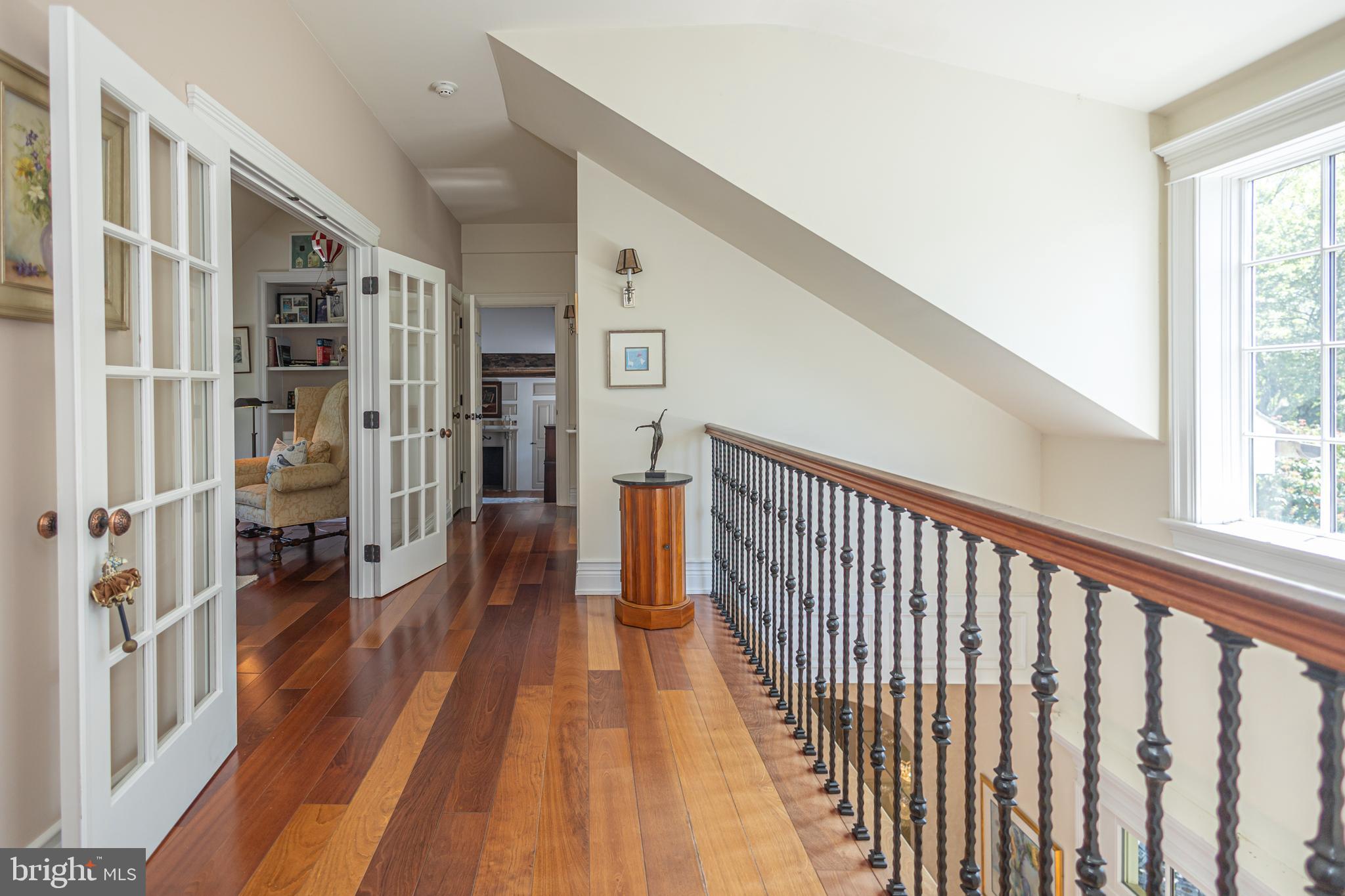 5025 Anderson Road Doylestown, PA 18902 - Photo 54 of 92 a view of hallway with wooden floor and a window