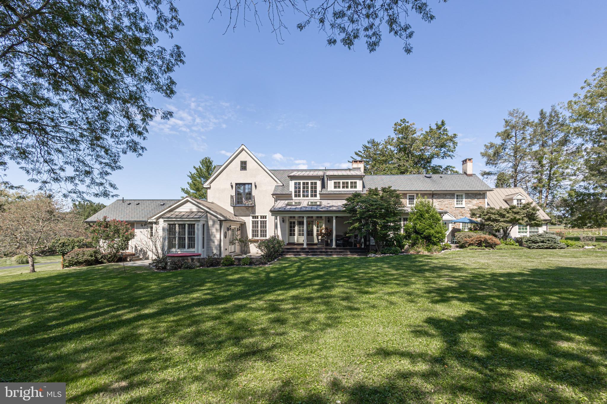 5025 Anderson Road Doylestown, PA 18902 - Photo 63 of 92 a view of a house with a big yard