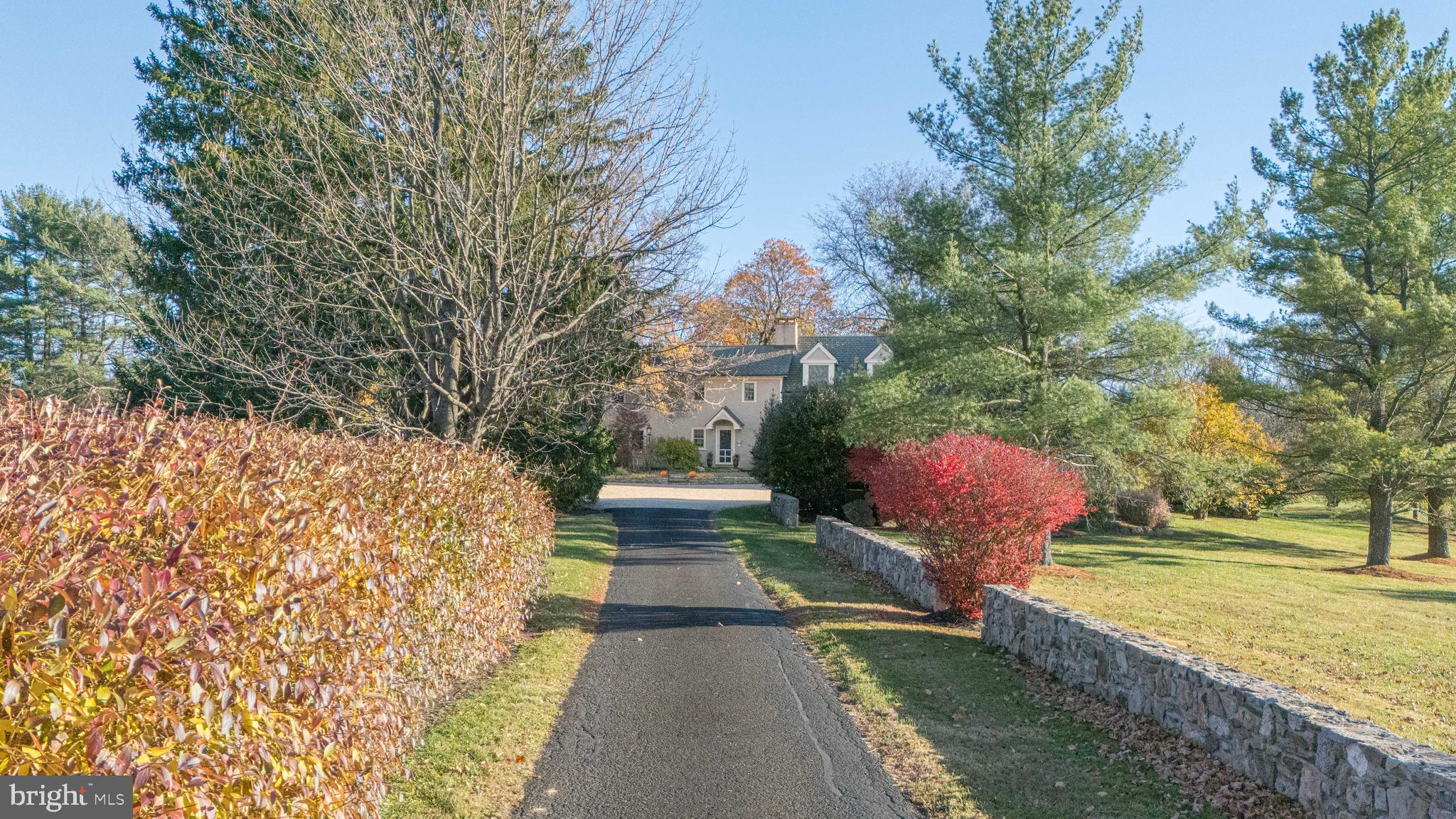 5025 Anderson Road Doylestown, PA 18902 - Photo 77 of 92 a backyard of a house with lots of green space