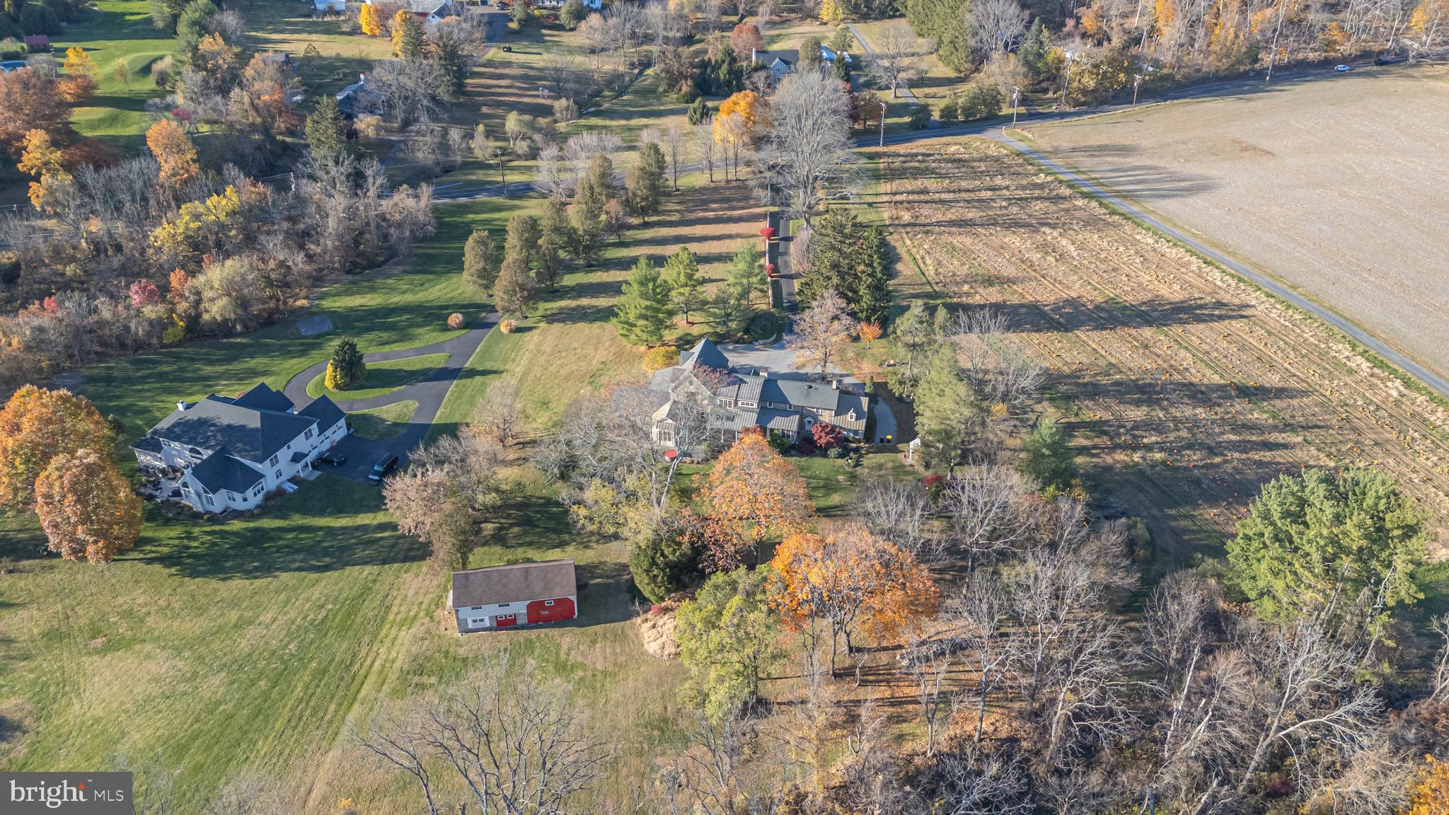 5025 Anderson Road Doylestown, PA 18902 - Photo 83 of 92 an aerial view of residential houses with outdoor space