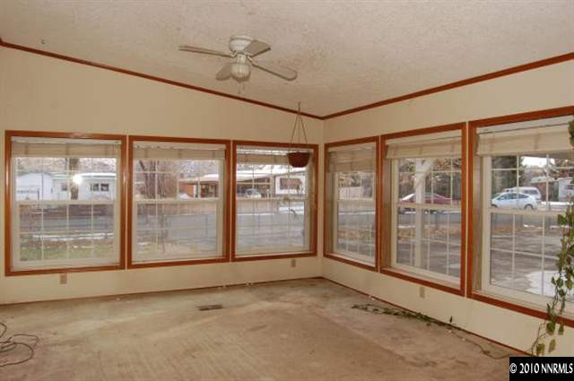 265 Aristocrat Way Reno, NV 89506 - Photo 3 of 7 a view of an empty room with windows