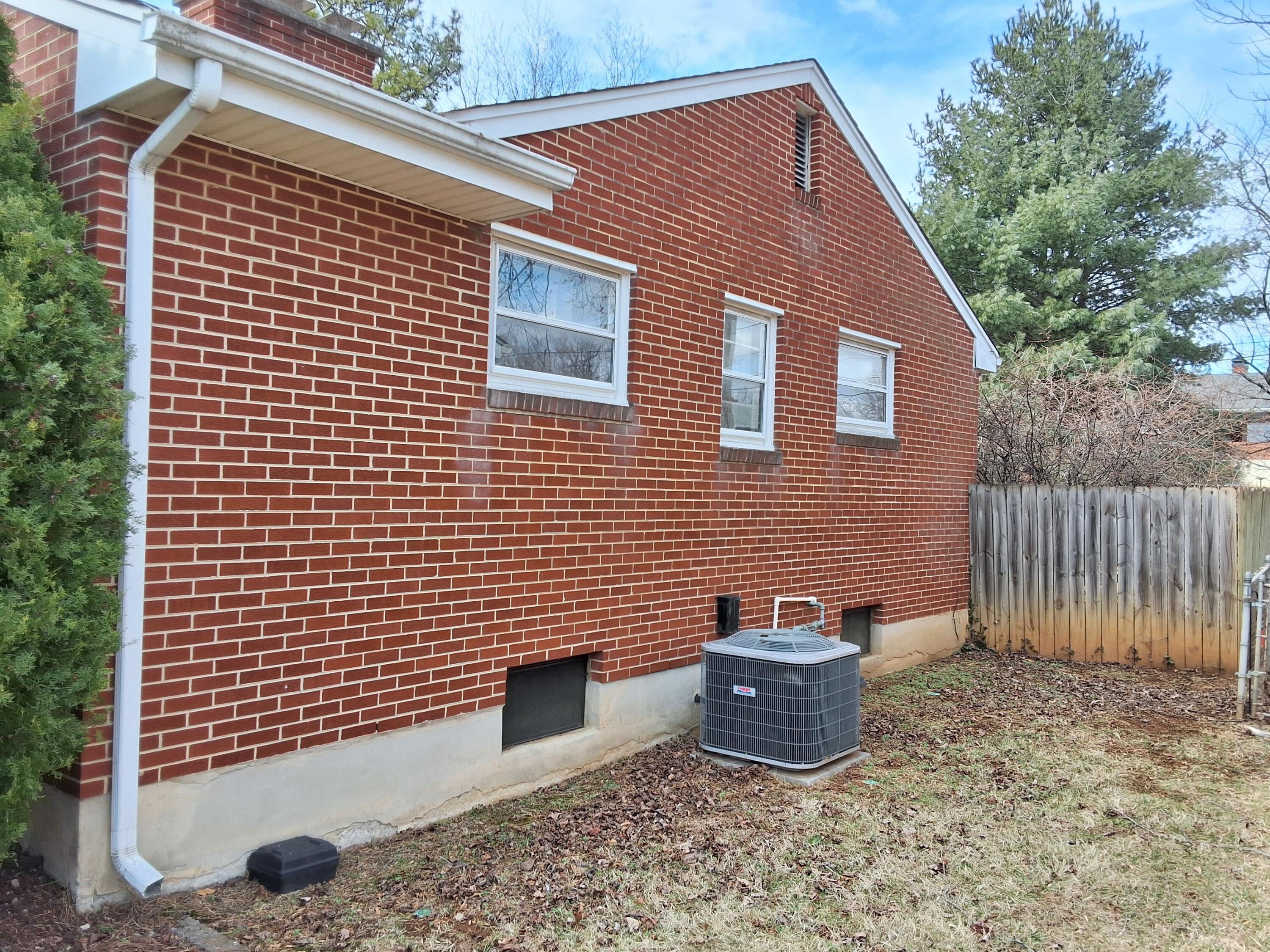 2639 Edgewood Street Southwest Roanoke, VA 24015 - Photo 9 of 12 a backyard of a house with barbeque oven