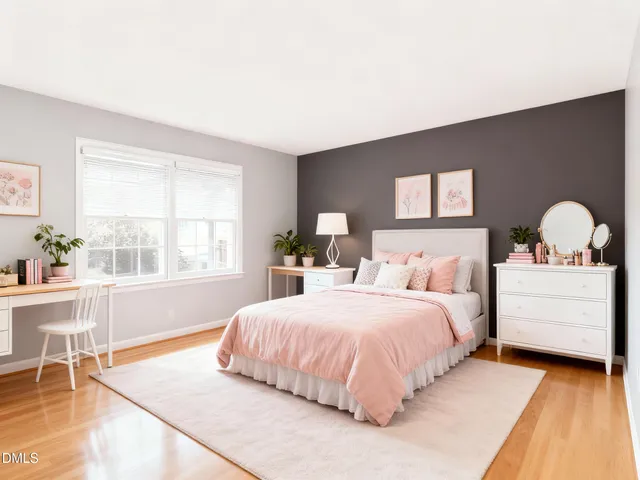 a bedroom with a bed and a table