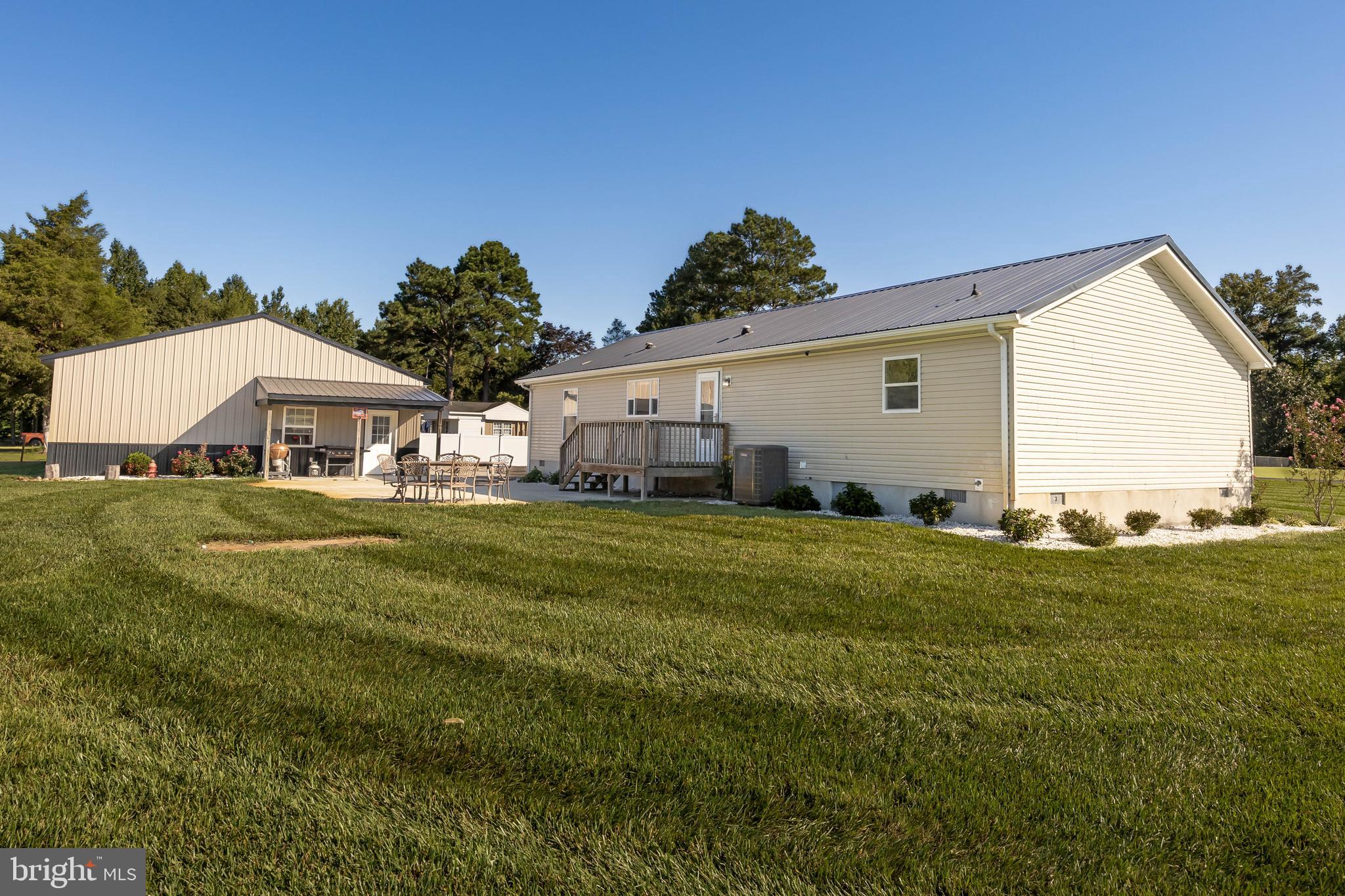 8364 Pittsville Road Parsonsburg, MD 21849 - Photo 50 of 65 a front view of house with yard and green space