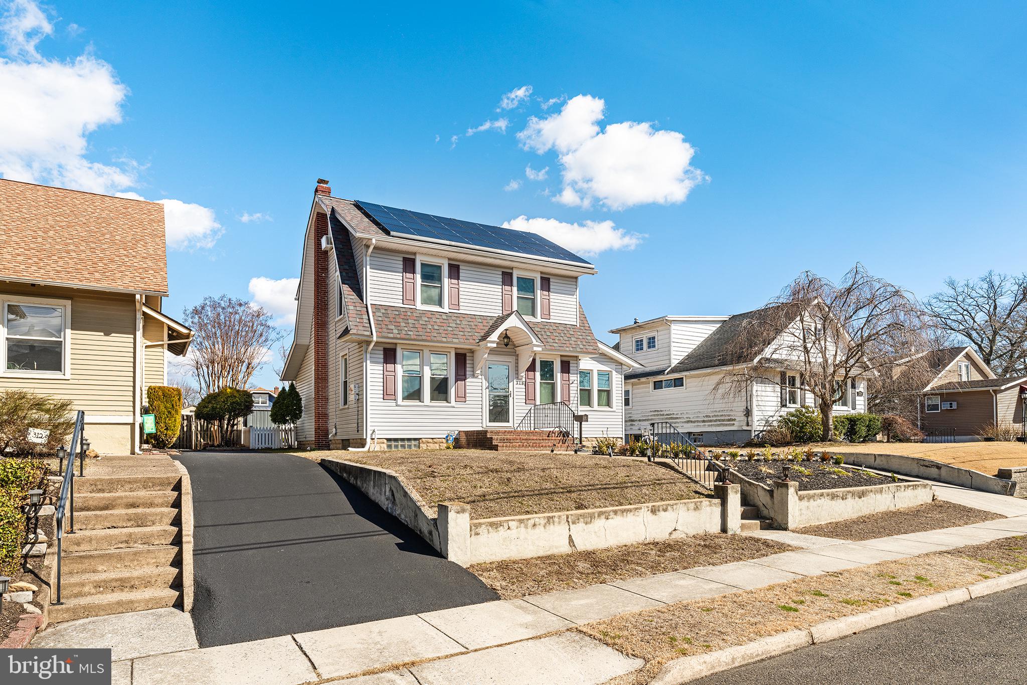 318 Center Avenue Delanco, NJ 08075 - Photo 3 of 27 a view of a house with a yard