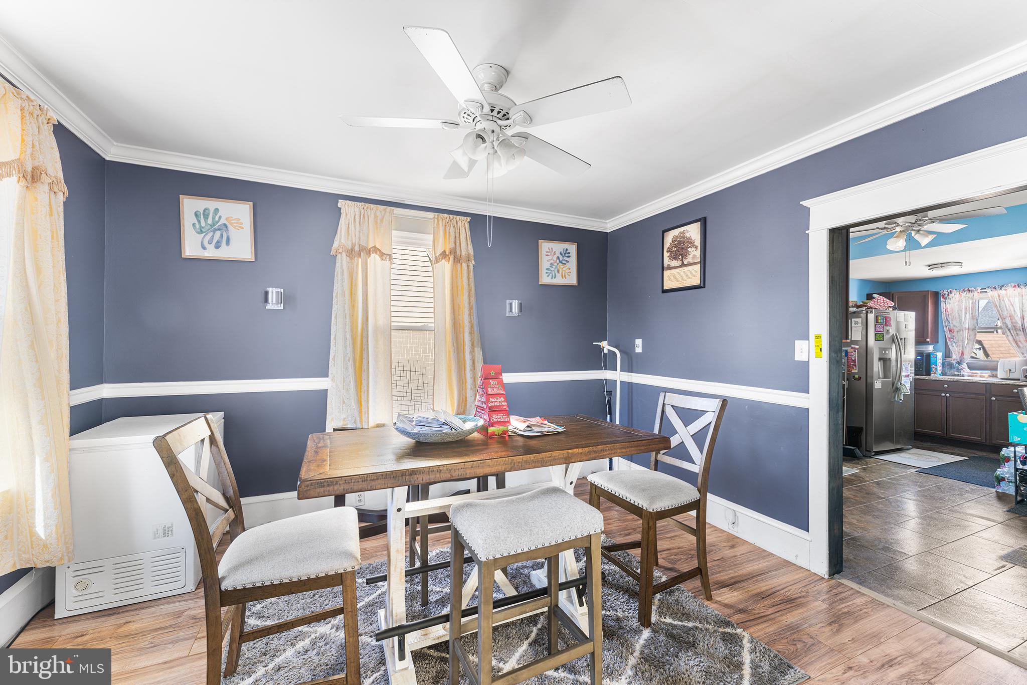 318 Center Avenue Delanco, NJ 08075 - Photo 8 of 27 a view of a dining room with furniture window and wooden floor