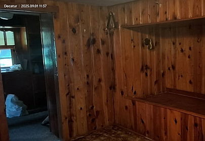 2304 East Division Street Decatur, IL 62526 - Photo 13 of 19 a view of a hallway with wooden cabinets