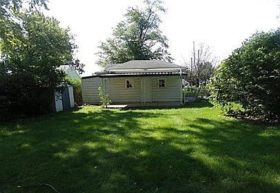 2304 East Division Street Decatur, IL 62526 - Photo 2 of 19 a view of a house with a backyard