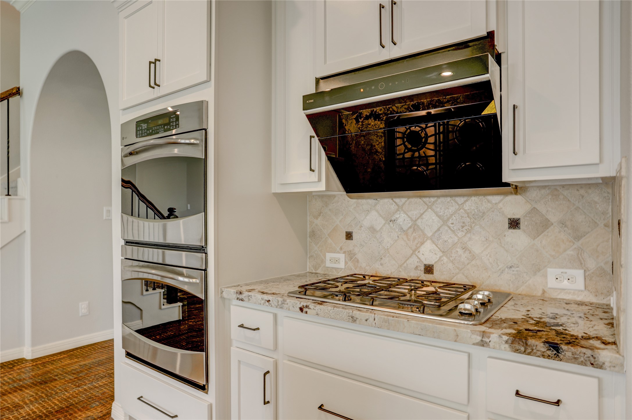 3002 Currant Drive Manvel, TX 77578 - Photo 11 of 43 a stove top oven sitting inside of a kitchen