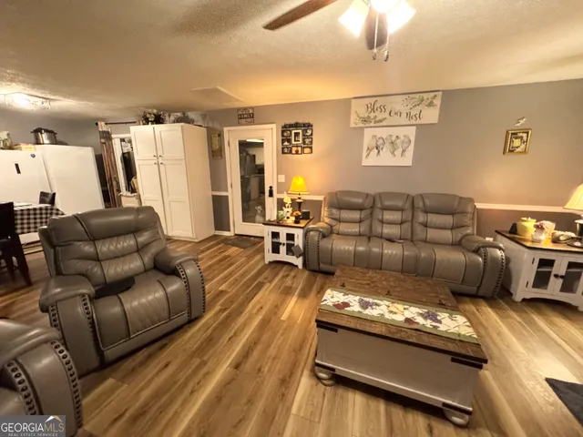 a living room with furniture and a couch