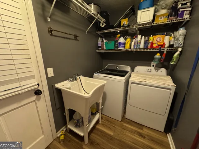 a utility room with dryer and washer
