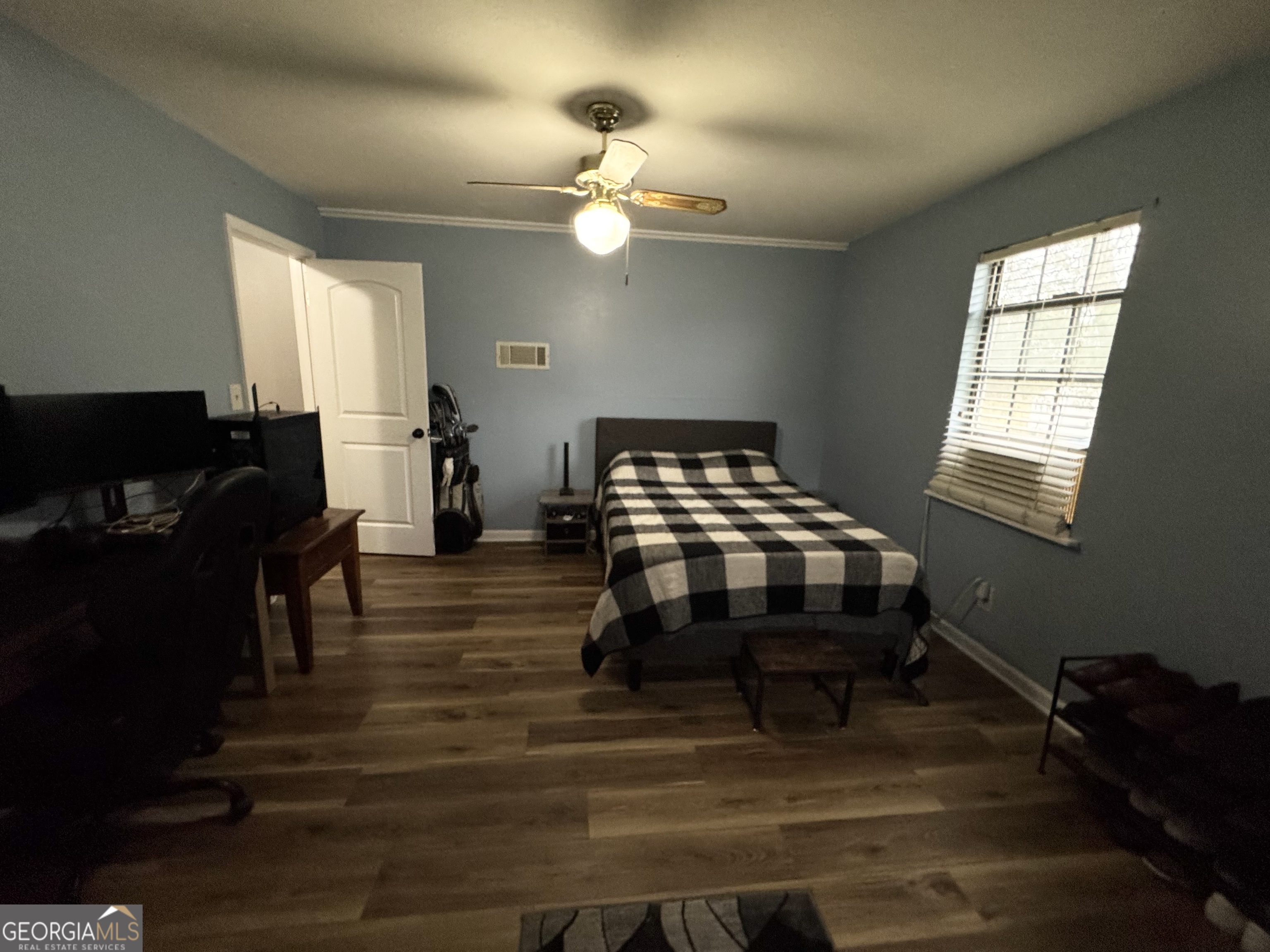 509 Lakeview Drive Dexter, GA 31019 - Photo 17 of 41 a living room with furniture and wooden floor