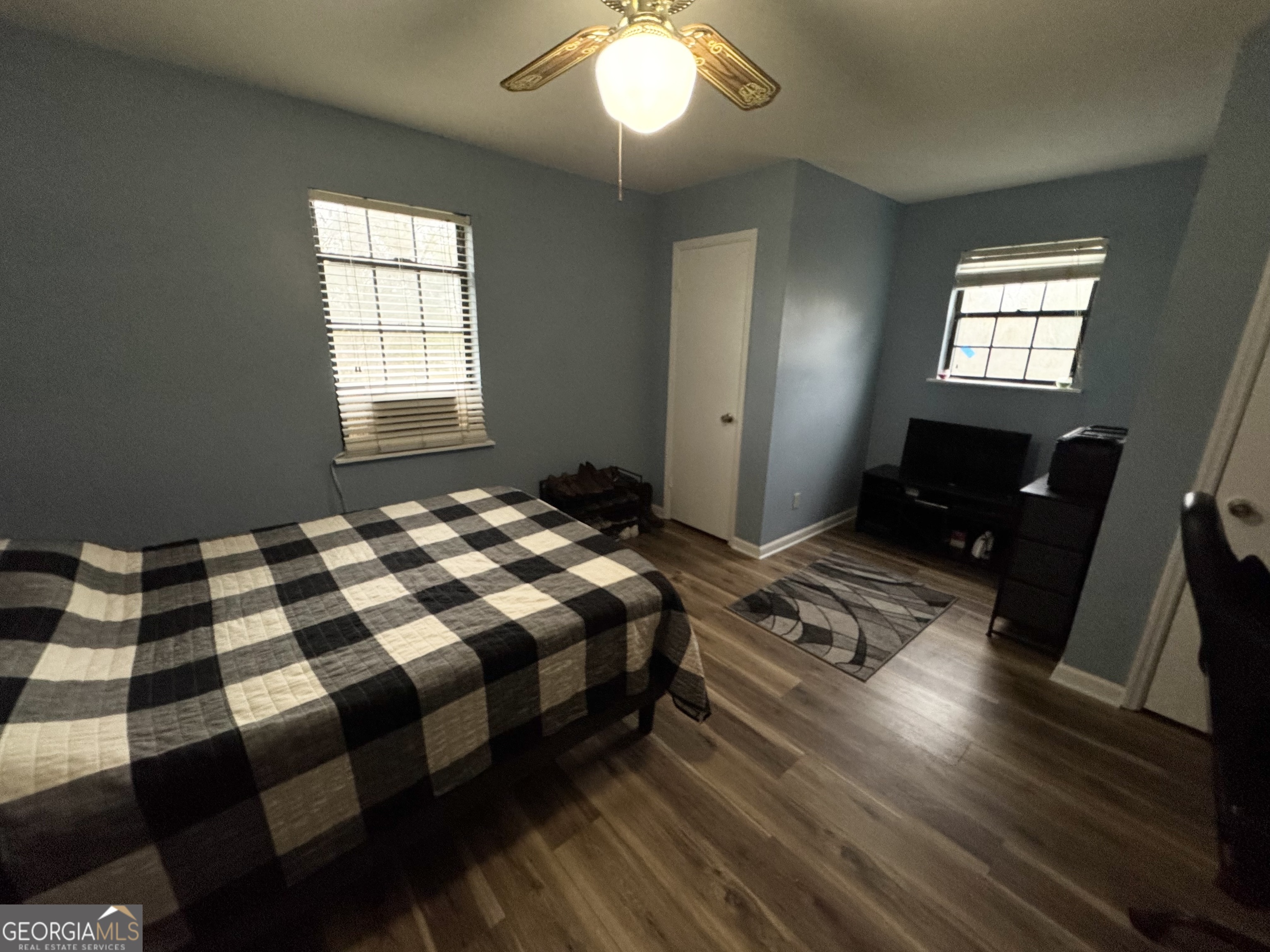 509 Lakeview Drive Dexter, GA 31019 - Photo 19 of 41 a bedroom with a bed and a window