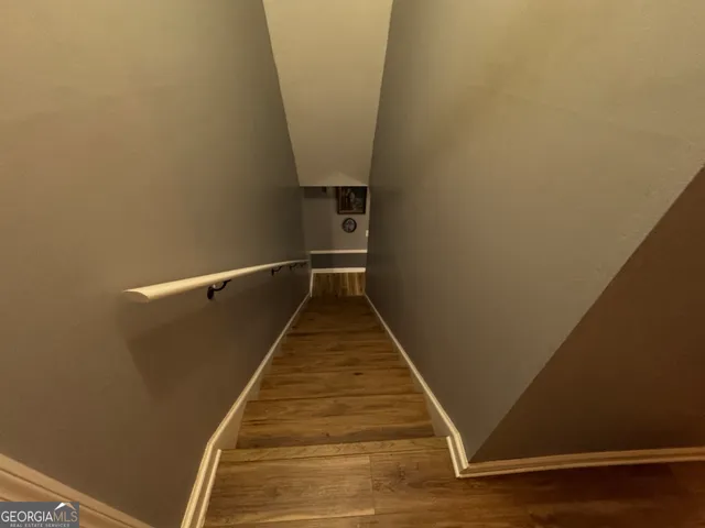 a view of balcony with wooden floor