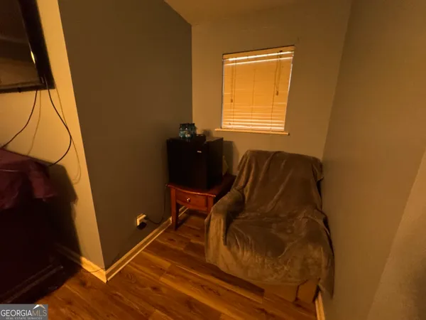 a room with a bed and a window