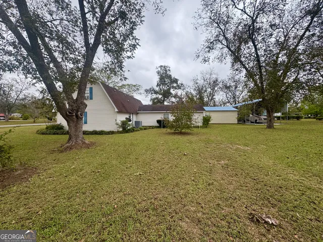 a house view with a garden space