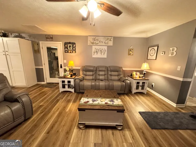 a living room with furniture and a couch